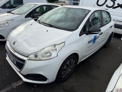 a white car that is parked in a parking lot