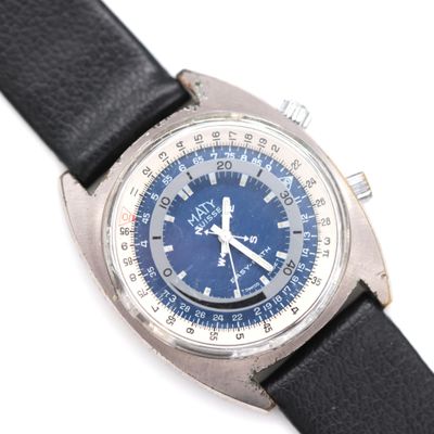 a close up of a wrist watch with a blue dial
