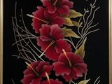 painting of red flowers on a black background with gold leaves