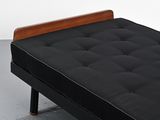 an image of a black futon bed with a wooden frame