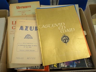 many books in a box on the table