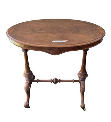 a small table with a wooden top on a white background