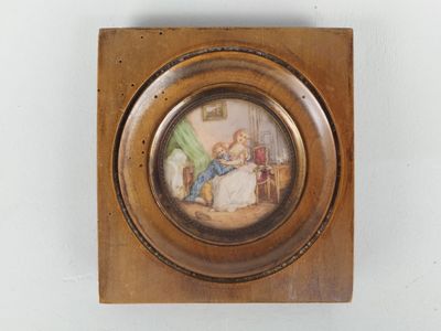 une photo d'une photo représentant un homme et une femme sur un lit
