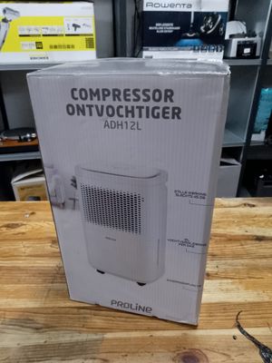 une photo d'un emballage de purificateur d'air posé sur une table