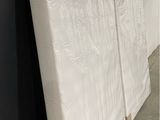 two pieces of white marble are stacked on top of each other
