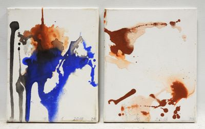 two paintings of different colors on a white surface with paint splatters