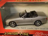 a box with a toy car in it on a table
