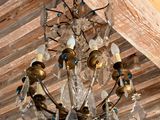 a chandelier hanging from the ceiling in a room