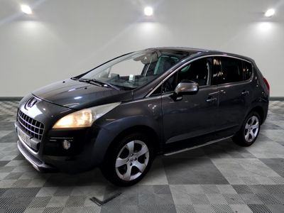 a picture of a black car parked in a garage
