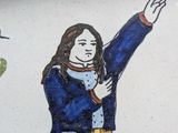 a painting of a woman holding a bird in her hand