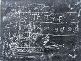 un tableau noir sur lequel est dessiné un bateau