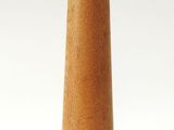 a wooden cone with a black top on a white background
