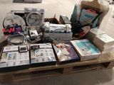 a box full of electronic equipment sitting on a pallet
