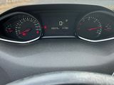 a car dashboard with a speedometer and gauges on it