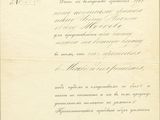 un vieux document portant un cachet, posé sur une table