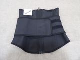 a close up of a black waist belt with a tag on it