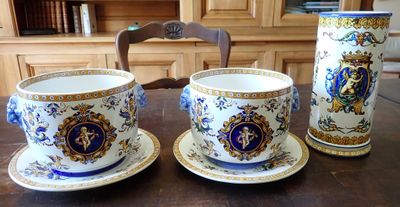 three cups and saucers sitting on a wooden table