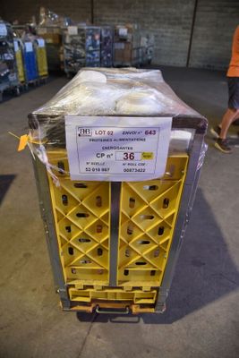 a cart that has a lot of boxes on it