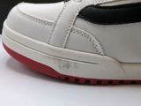 a close up of a pair of shoes on a table