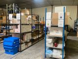 many boxes and boxes on the shelves in the warehouse
