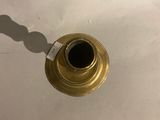 a small candle that is sitting on a white table