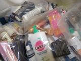 many items in the plastic bag on the bed