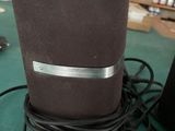 an image of a speaker on a table in a room