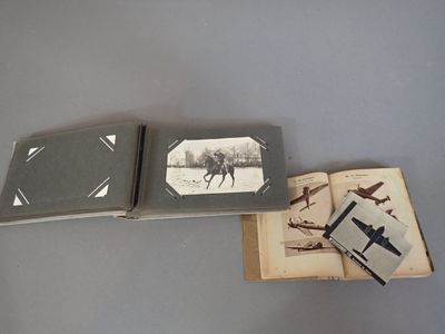 two open books sitting on top of a table next to each other