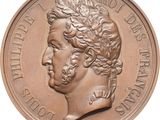 an image of a coin with a portrait of a man on it
