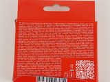 the back of a red box with a barcode on it