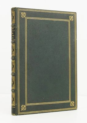 an old green book with gold trim and a gold border