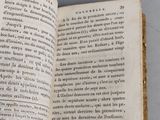 a book open to a page with a picture of a bird on it