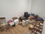 a room full of boxes and boxes on the floor