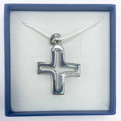 sterling silver cross pendant in a gift box with a white rope