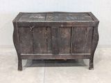an old wooden chest sitting on the floor