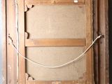 an old picture frame with a rope hanging from it ' s side