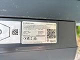 a close up of a parking meter with a qr code on it