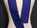 a close up of a mannequin torso with a blue scarf on it