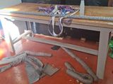 a picture of a workbench with a bunch of tools on top of it