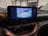 a picture of a car dashboard with a camera on it