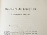 an open book with a black and white design on it