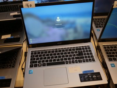 many laptops that are sitting on a table