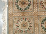 an image of a rug with many different designs on it