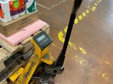a pallet with a lot of items on it in a warehouse