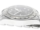 a close up of a watch on a white background