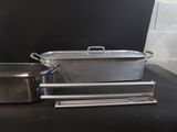 two pans and a pan on a table
