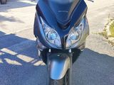 a motorcycle that is parked on the side of the road