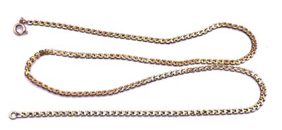 a close up of a chain on a white surface