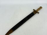 a close up of a knife on a white surface with a white background