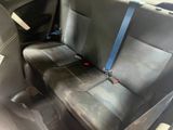 a seat belt that is attached to the back of a car
